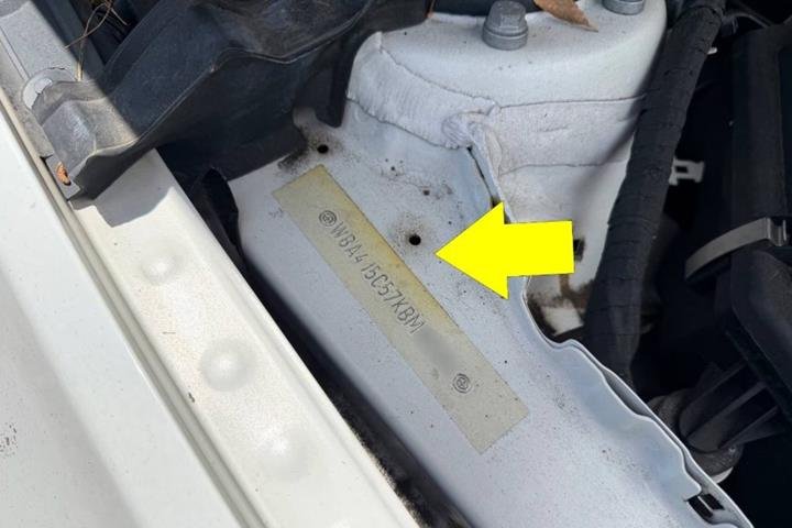 VIN plate stamped in the engine bay
