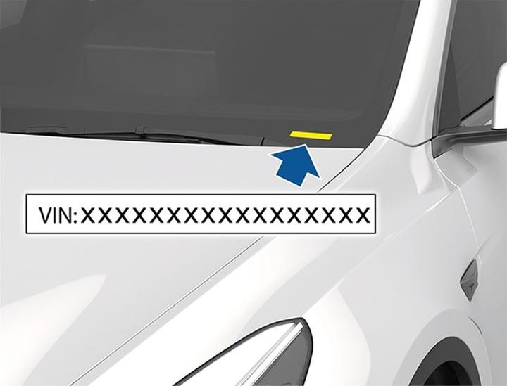 VIN plate visible through the base of the windscreen